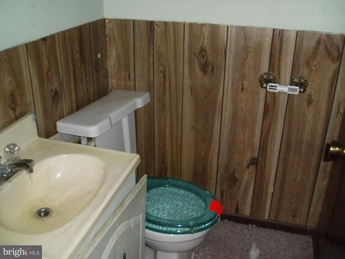 620 Banyan Road Edgewood, MD 21040 - Photo 10 of 15 a bathroom with a sink and a toilet