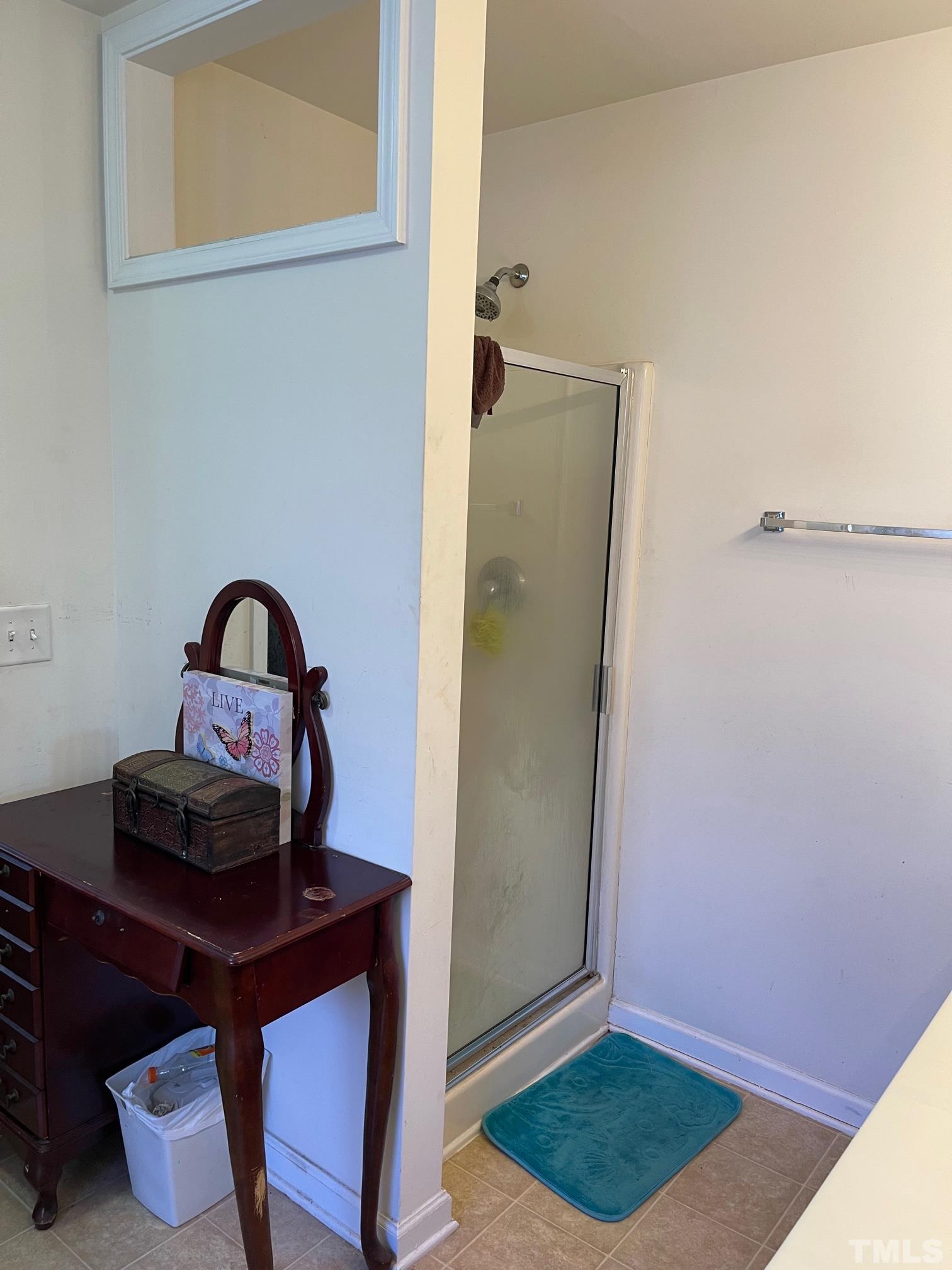 3516 Rendition Street Raleigh, NC 27610 - Photo 23 of 24 a view of a livingroom with wooden floor and small cabinet