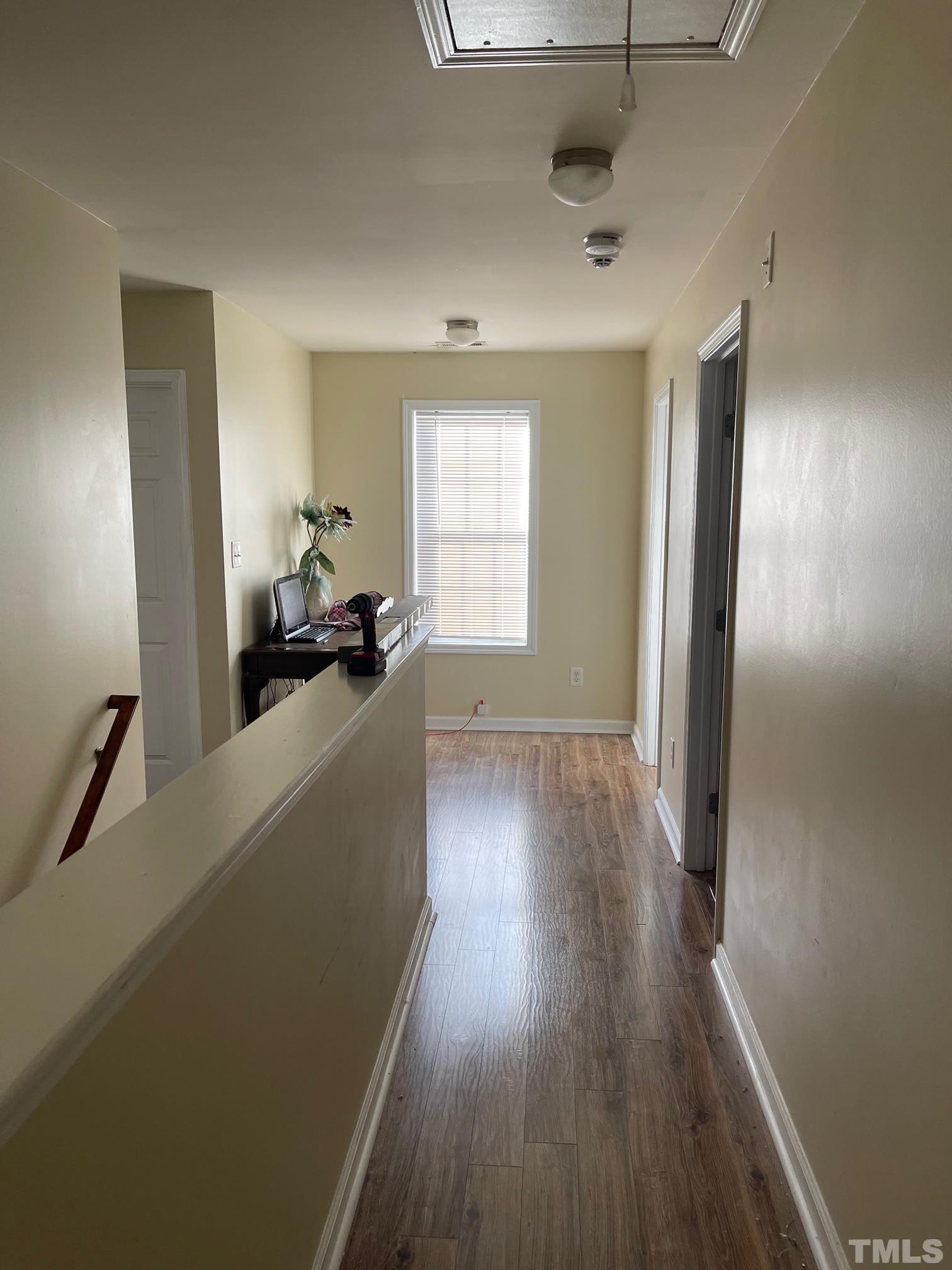 3516 Rendition Street Raleigh, NC 27610 - Photo 24 of 24 a view of a room with wooden floor and windows