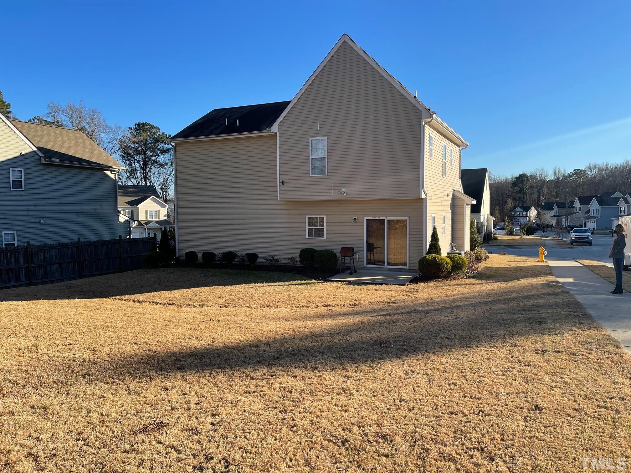 3516 Rendition Street Raleigh, NC 27610 - Photo 3 of 24 a front view of a house with a yard