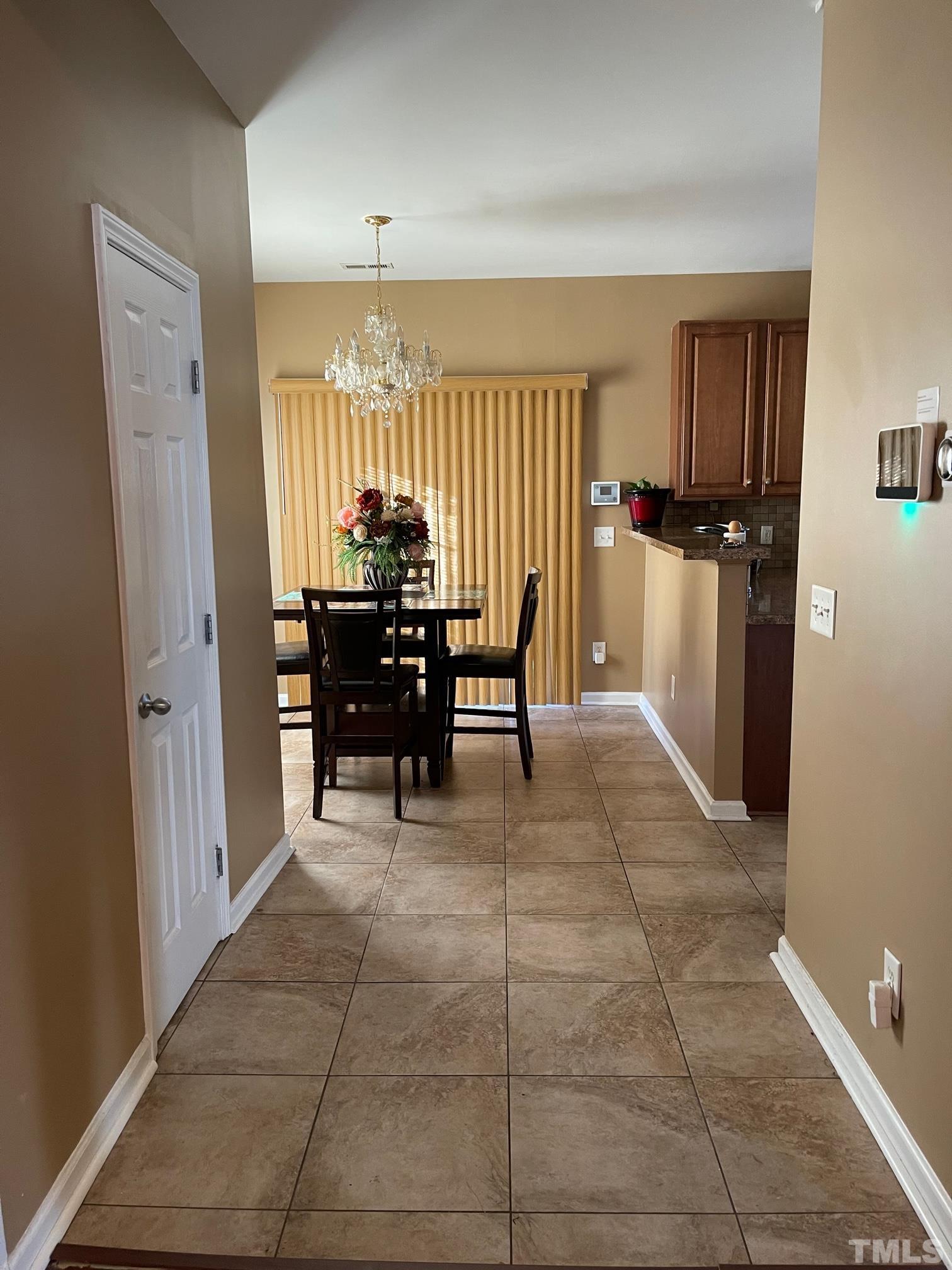 3516 Rendition Street Raleigh, NC 27610 - Photo 7 of 24 a view of kitchen with furniture and refrigerator