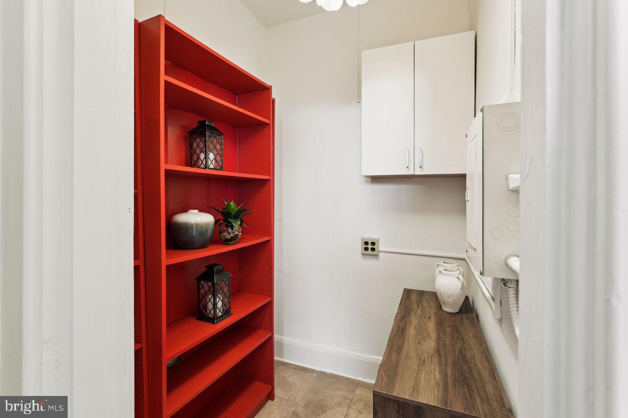 516 A Street Northeast, Unit 205 Washington, DC 20002 - Photo 16 of 24 a view of walk in closet with clothes and shoes