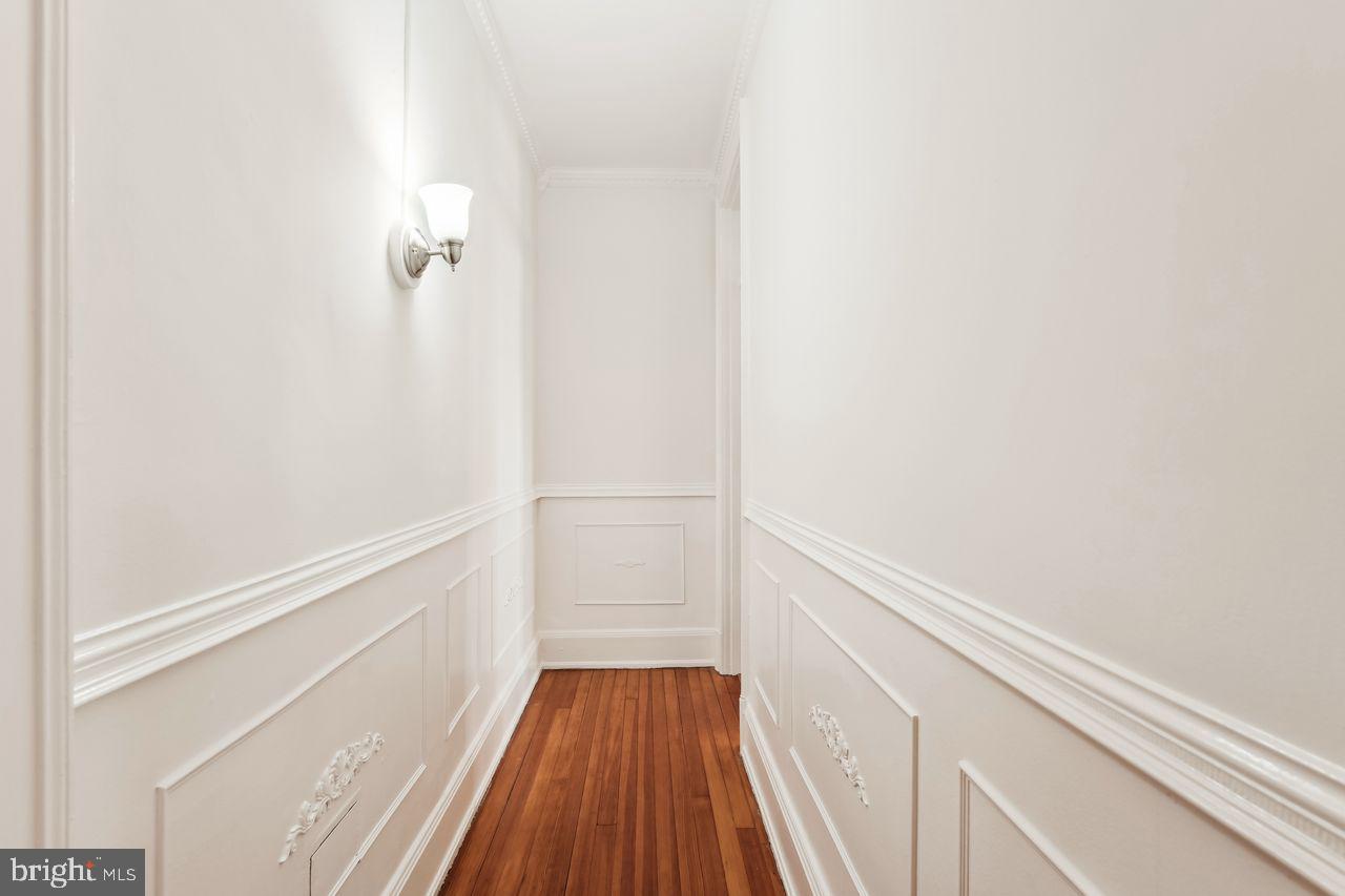 516 A Street Northeast, Unit 205 Washington, DC 20002 - Photo 19 of 24 a view of walk in closet with wooden floor