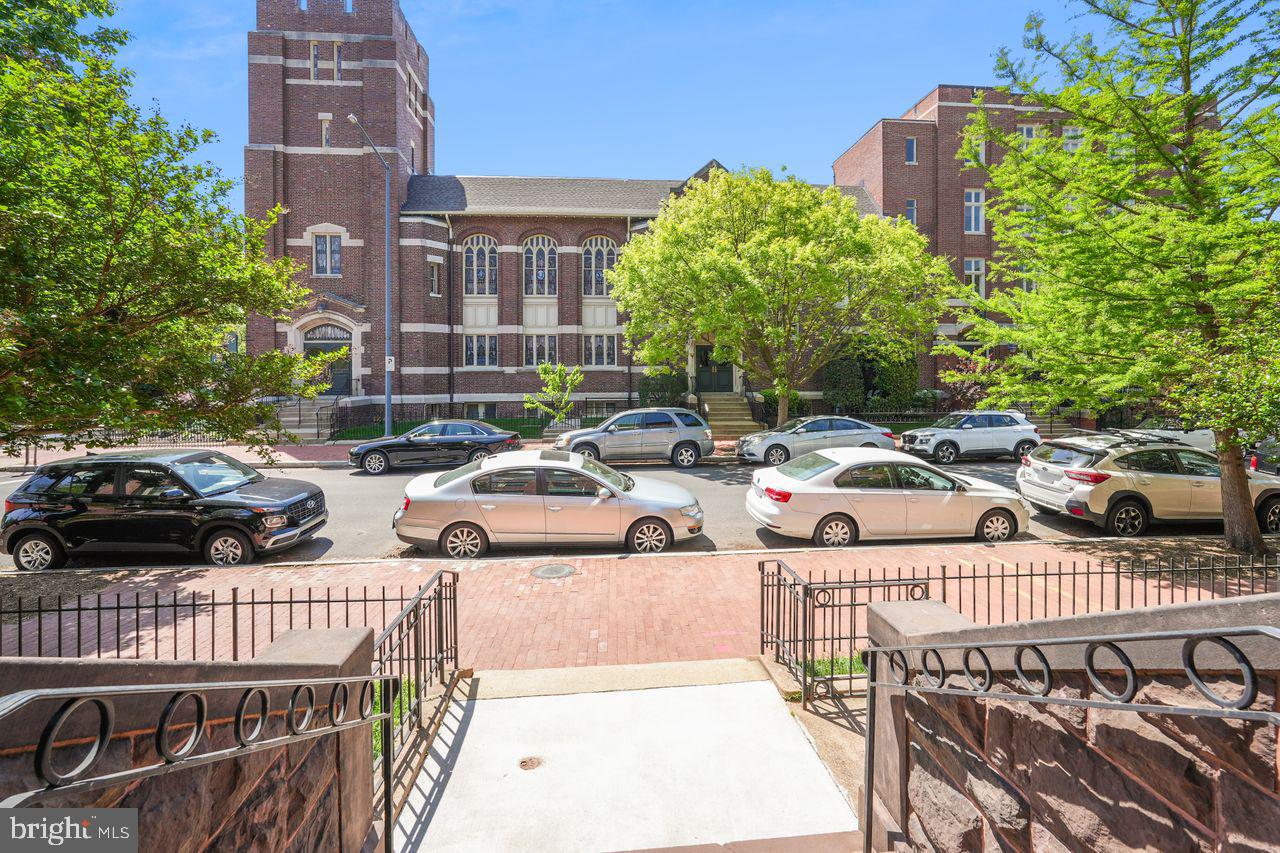 516 A Street Northeast, Unit 205 Washington, DC 20002 - Photo 24 of 24 a couple of cars parked in front of a building