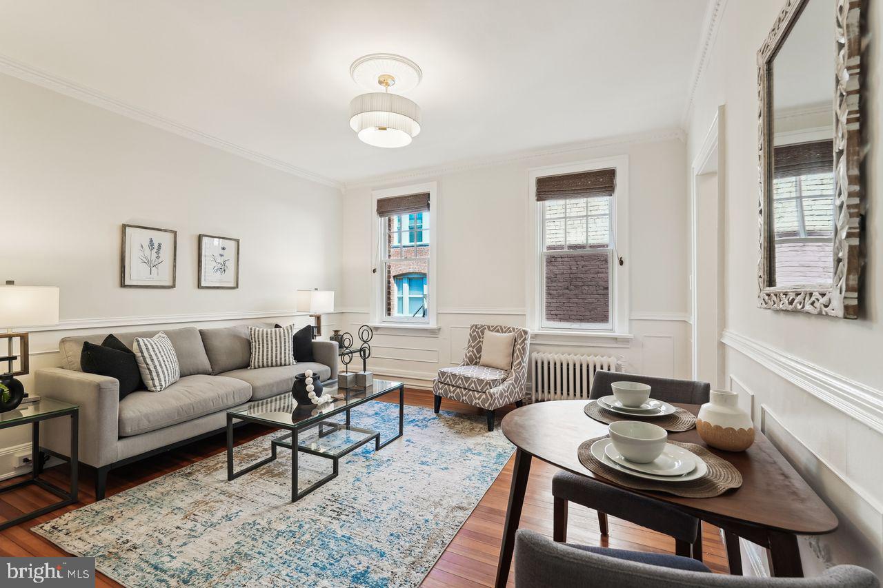 516 A Street Northeast, Unit 205 Washington, DC 20002 - Photo 5 of 24 a living room with furniture and a window