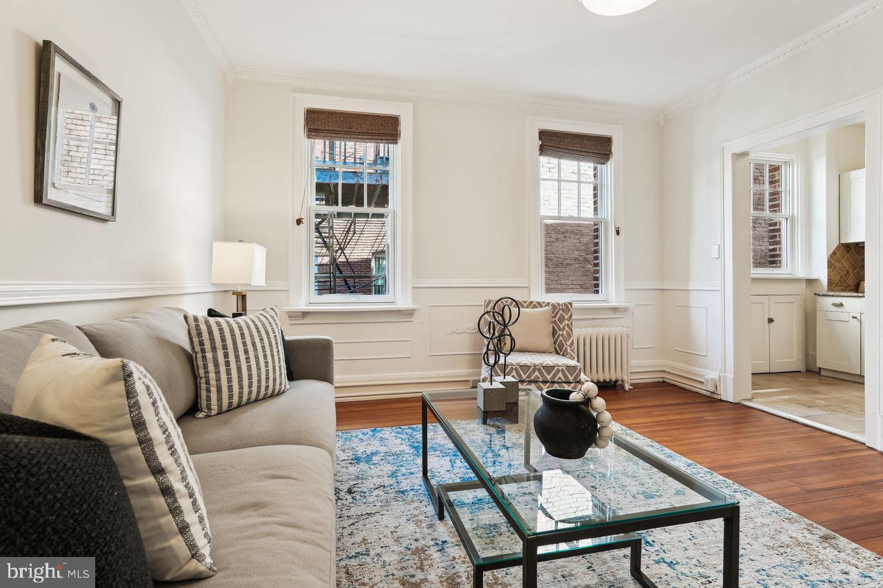 516 A Street Northeast, Unit 205 Washington, DC 20002 - Photo 10 of 24 a living room with furniture