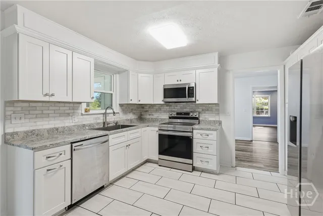 $460,000 | 1613 Lake Drive, Midway, GA 31320