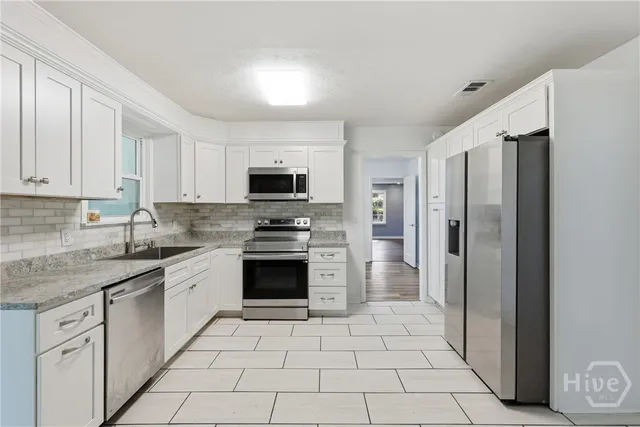 $460,000 | 1613 Lake Drive, Midway, GA 31320