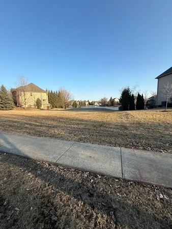 a view of an ocean beach and a building