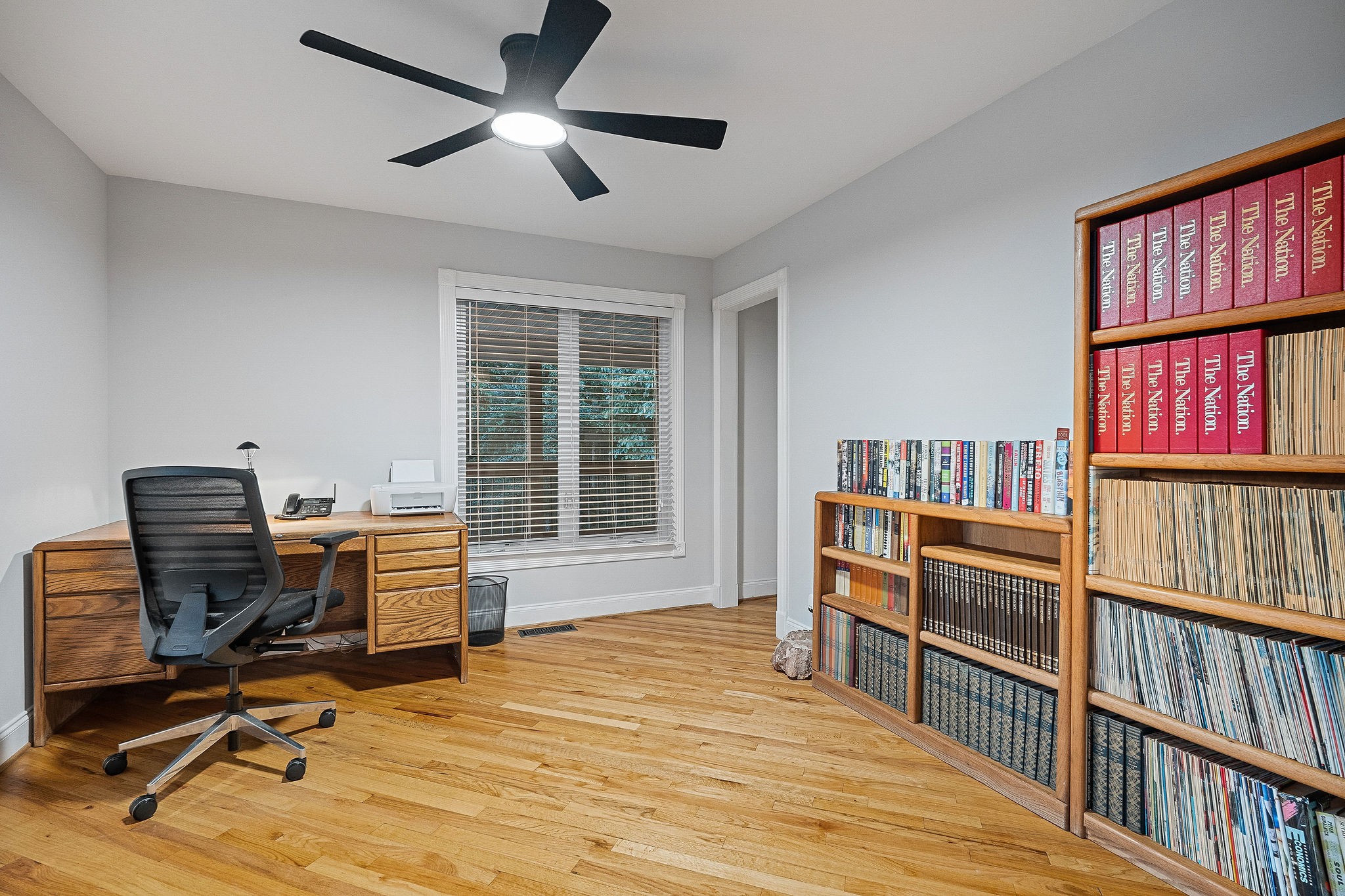 574 Hayes Ridge Road Lancaster, TN 38569 - Photo 15 of 53 a workspace with furniture hardwood and a window