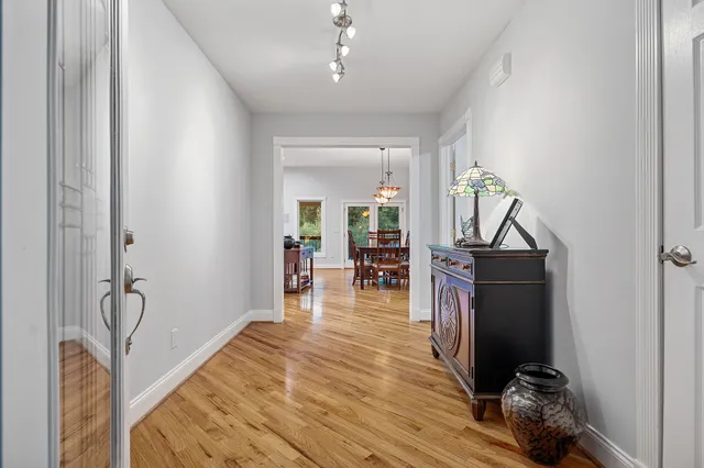 a bedroom with a bed and a book shelf
