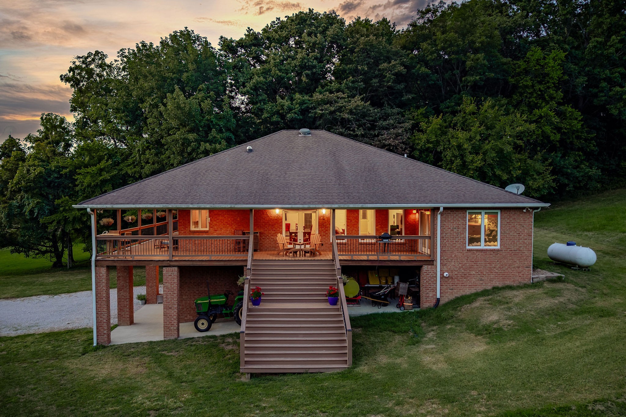574 Hayes Ridge Road Lancaster, TN 38569 - Photo 3 of 53 a front view of a house with garden