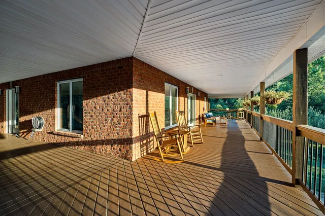 a view of swimming pool with a yard