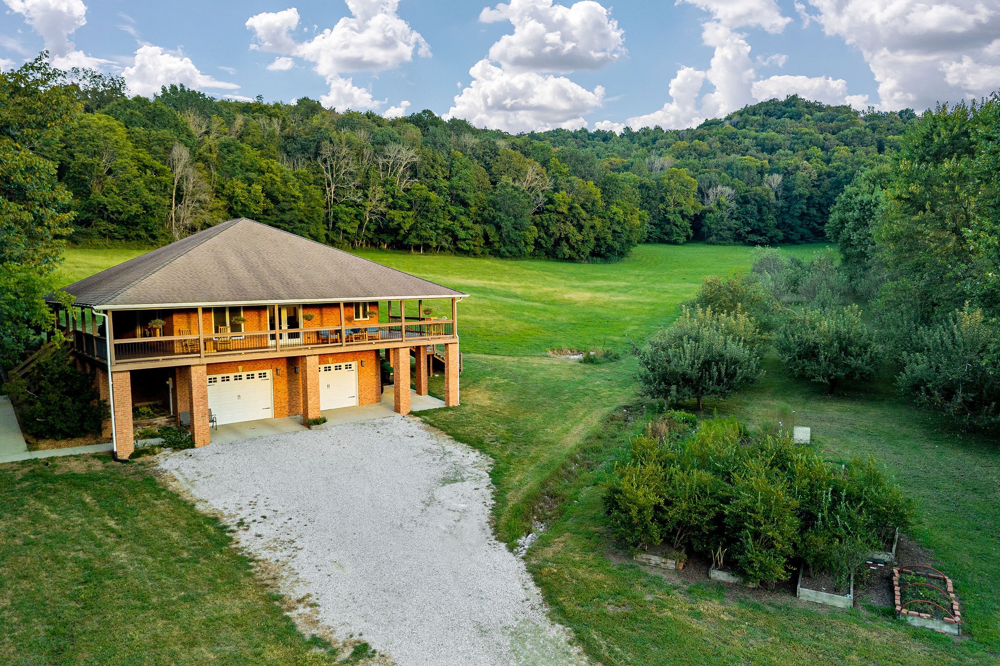 574 Hayes Ridge Road Lancaster, TN 38569 - Photo 45 of 53 a front view of a house with a yard