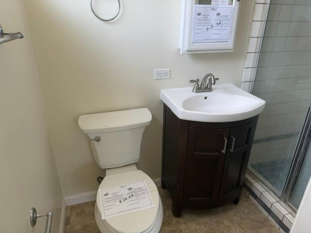 337 Quadra Avenue Rio Linda, CA 95673 - Photo 15 of 27 a bathroom with a toilet sink and mirror