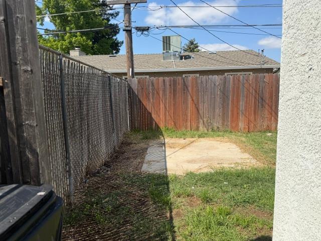 337 Quadra Avenue Rio Linda, CA 95673 - Photo 19 of 27 a view of a backyard with wooden fence
