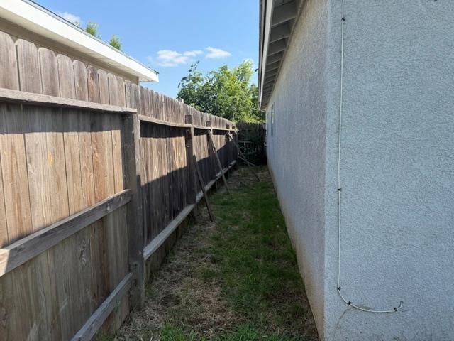 337 Quadra Avenue Rio Linda, CA 95673 - Photo 24 of 27 a view of a pathway of a house with wooden fence