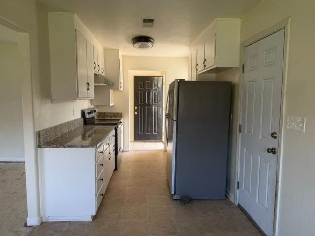 337 Quadra Avenue Rio Linda, CA 95673 - Photo 6 of 27 a kitchen with stainless steel appliances granite countertop a refrigerator and a stove