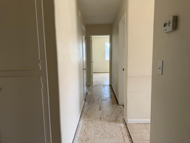 337 Quadra Avenue Rio Linda, CA 95673 - Photo 9 of 27 a view of a bathroom from a corridor