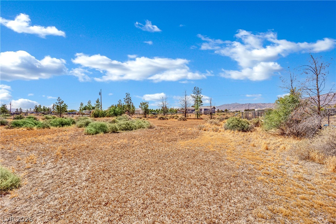 4361 Maple Road Pahrump, NV 89048 - Photo 42 of 46 A spacious, undeveloped lot with natural desert landscaping awaits your vision.