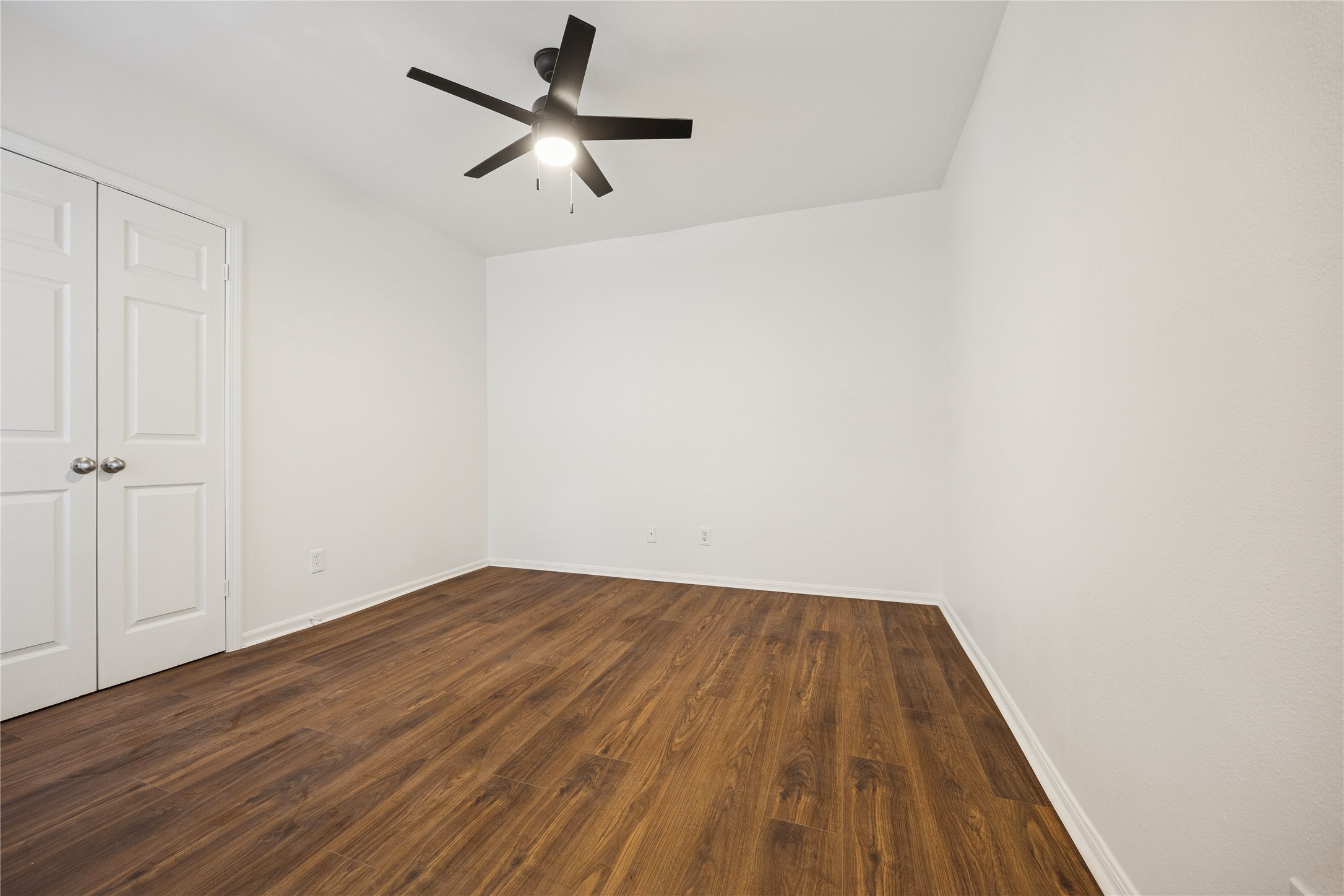 705 Harold Street, Unit 2 Houston, TX 77006 - Photo 13 of 15 a view of empty room with wooden floor