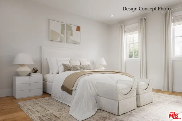 a bedroom with bed and window