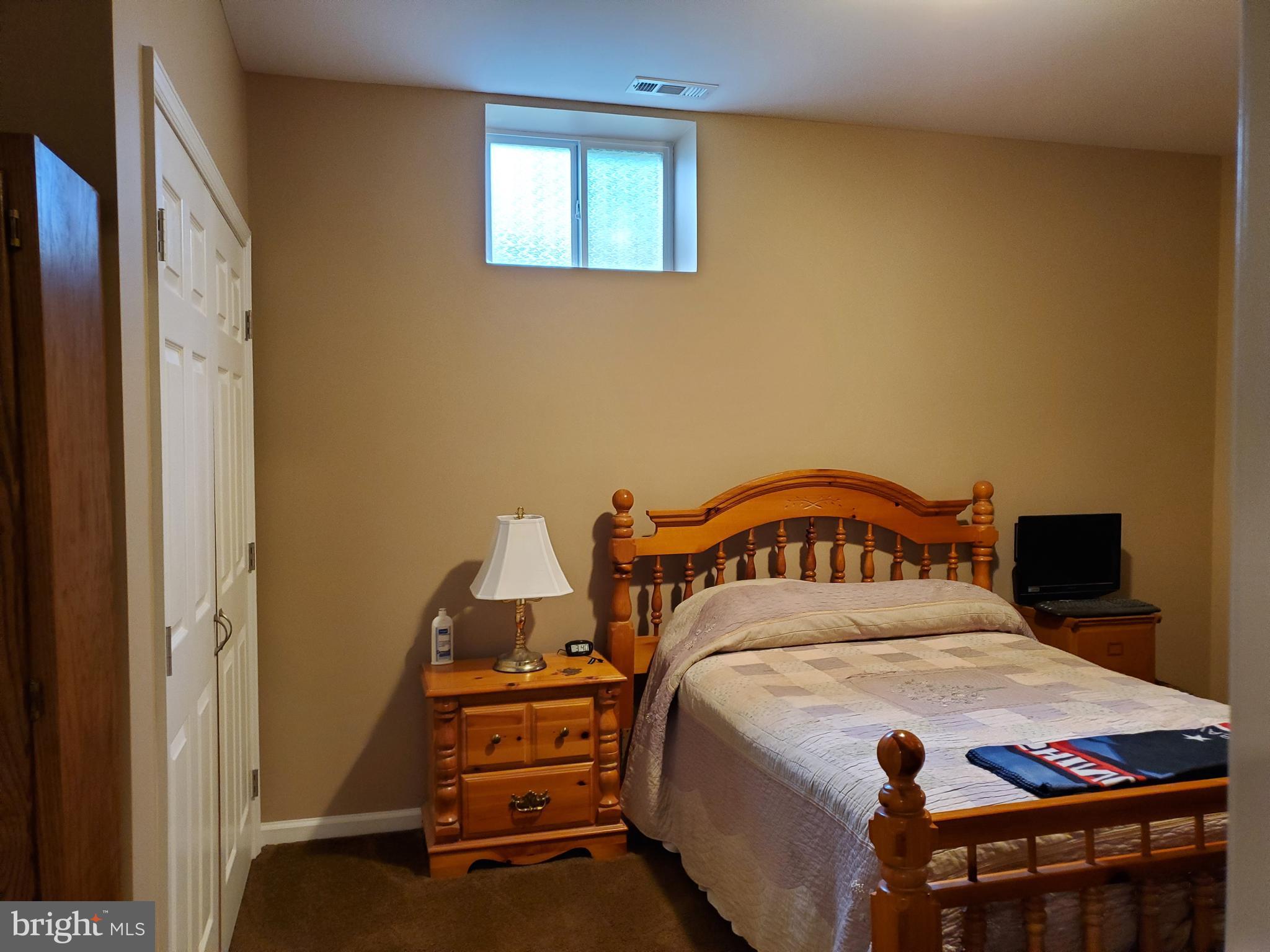 7520 Broomes Island Road St. Leonard, MD 20685 - Photo 31 of 35 Lower level den w/closet currently used as bdrm