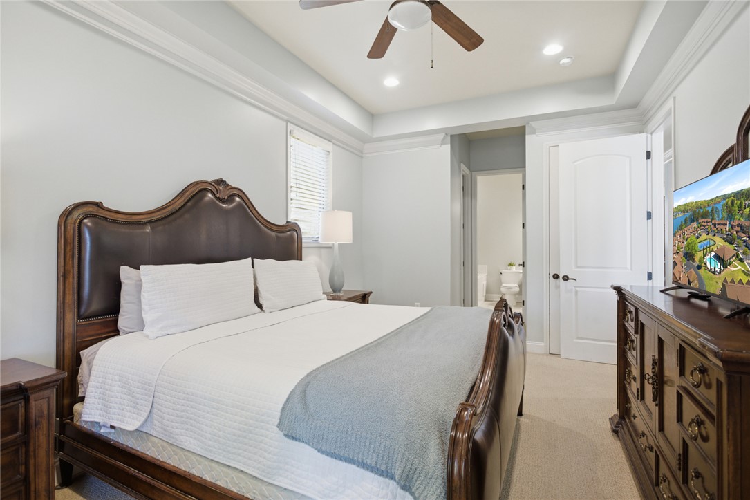 578 Sunset Point Drive West Union, SC 29696 - Photo 10 of 46 This tranquil bedroom offers comfort and a private attached bathroom.