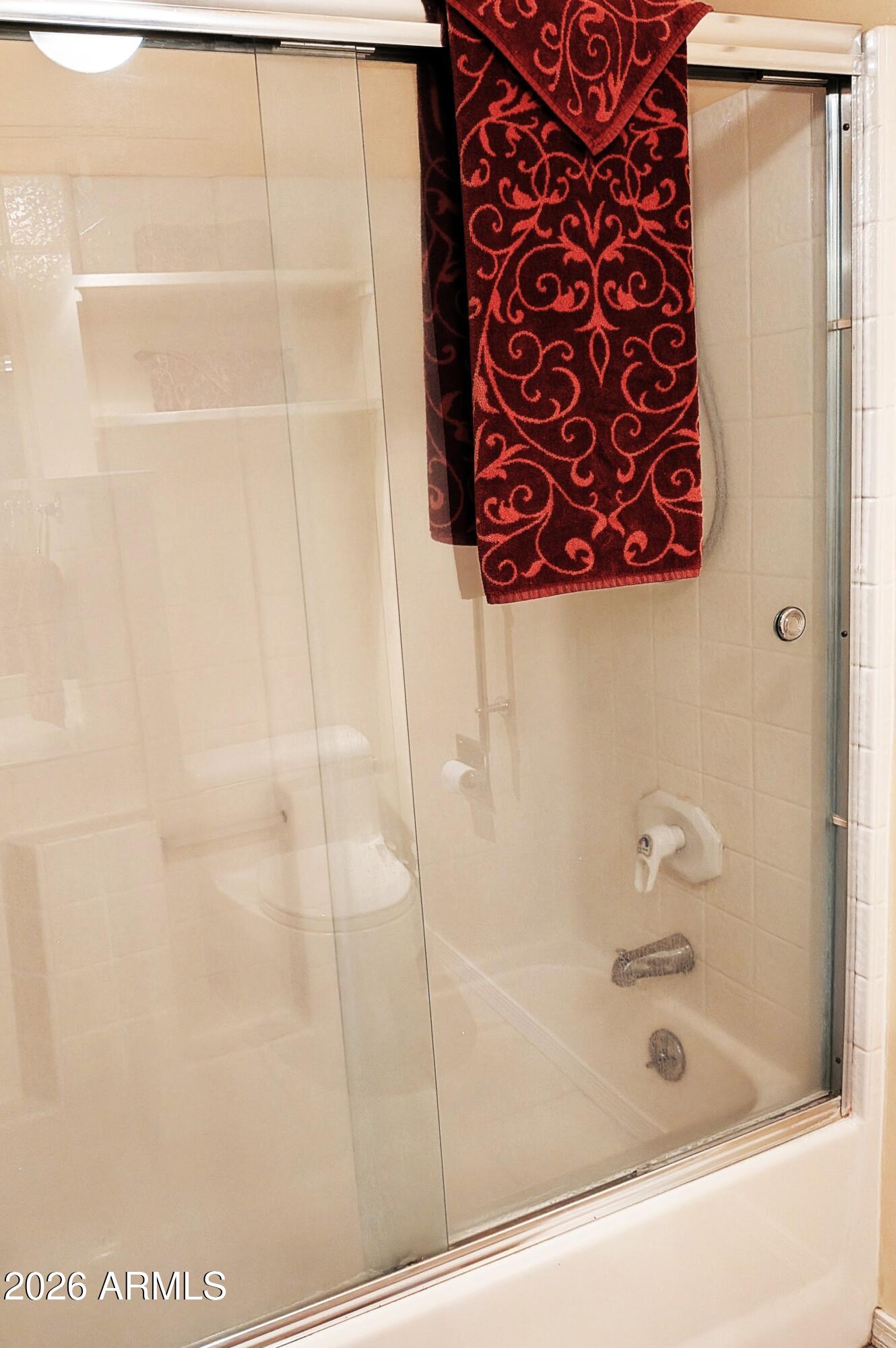 6700 East Thomas Road, Unit 25 Scottsdale, AZ 85251 - Photo 14 of 29 a bathroom with a bathtub and shower