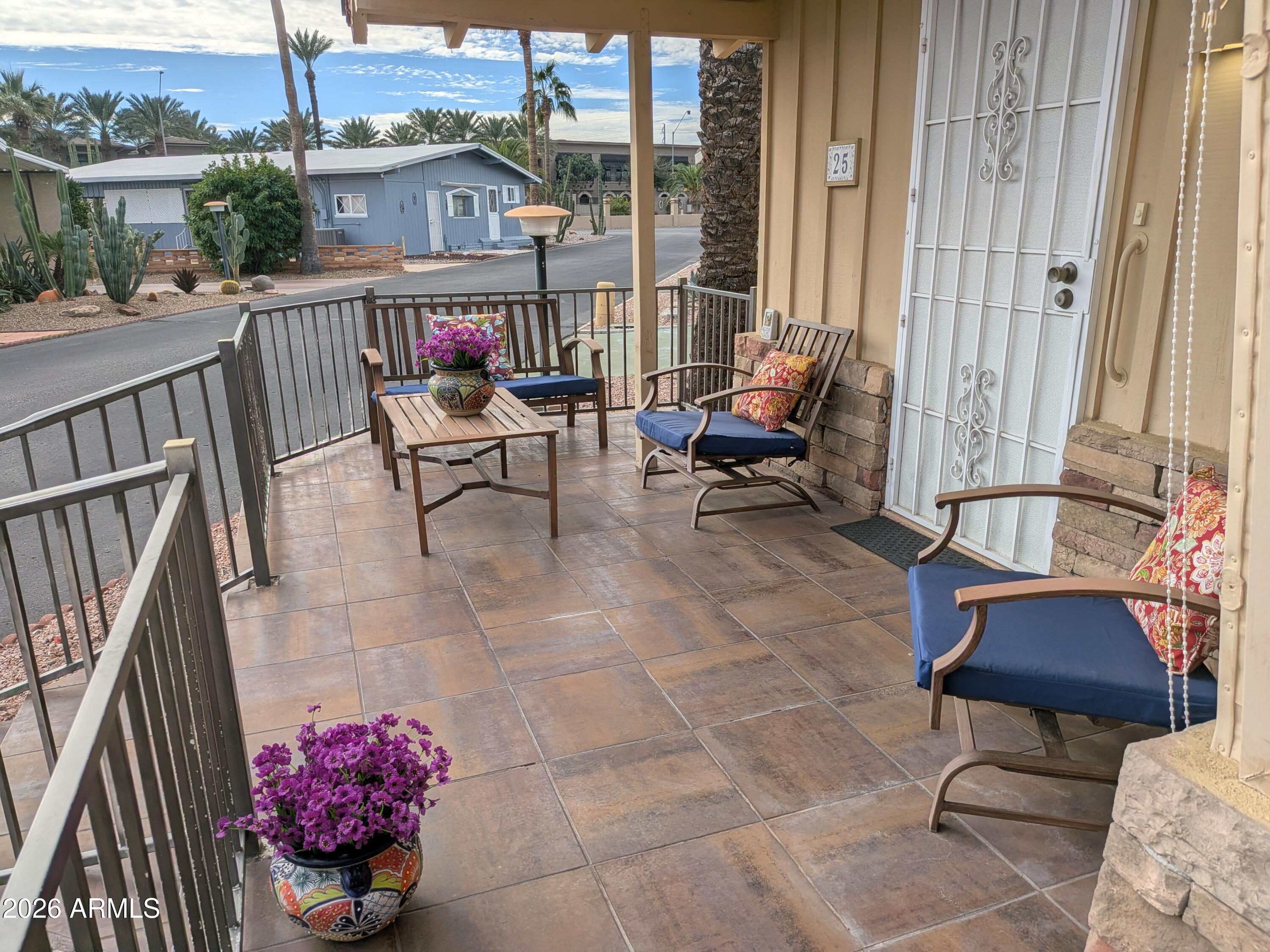 6700 East Thomas Road, Unit 25 Scottsdale, AZ 85251 - Photo 15 of 29 a view of a two chairs in the balcony