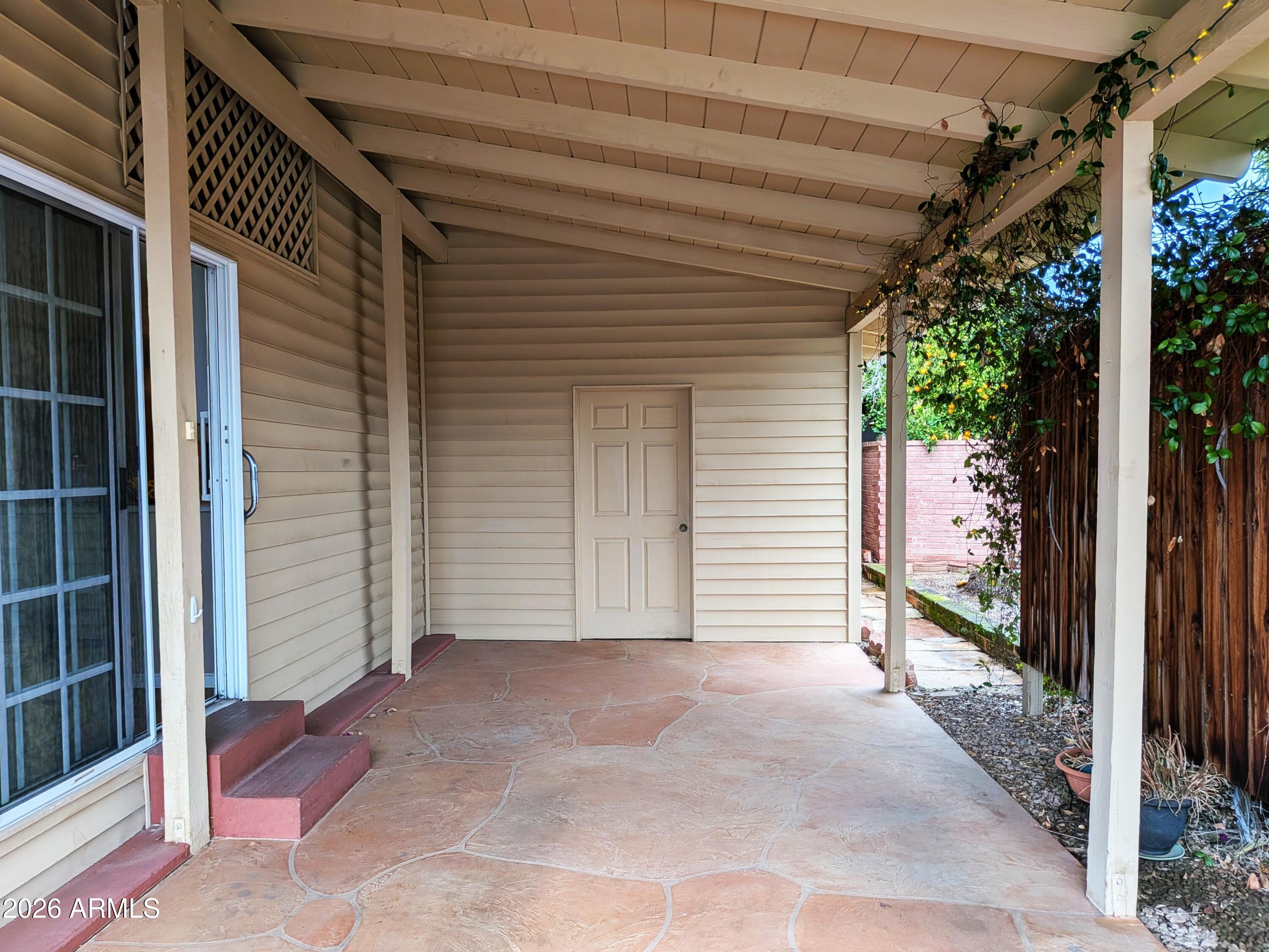 6700 East Thomas Road, Unit 25 Scottsdale, AZ 85251 - Photo 16 of 29 a view of a house with a garage