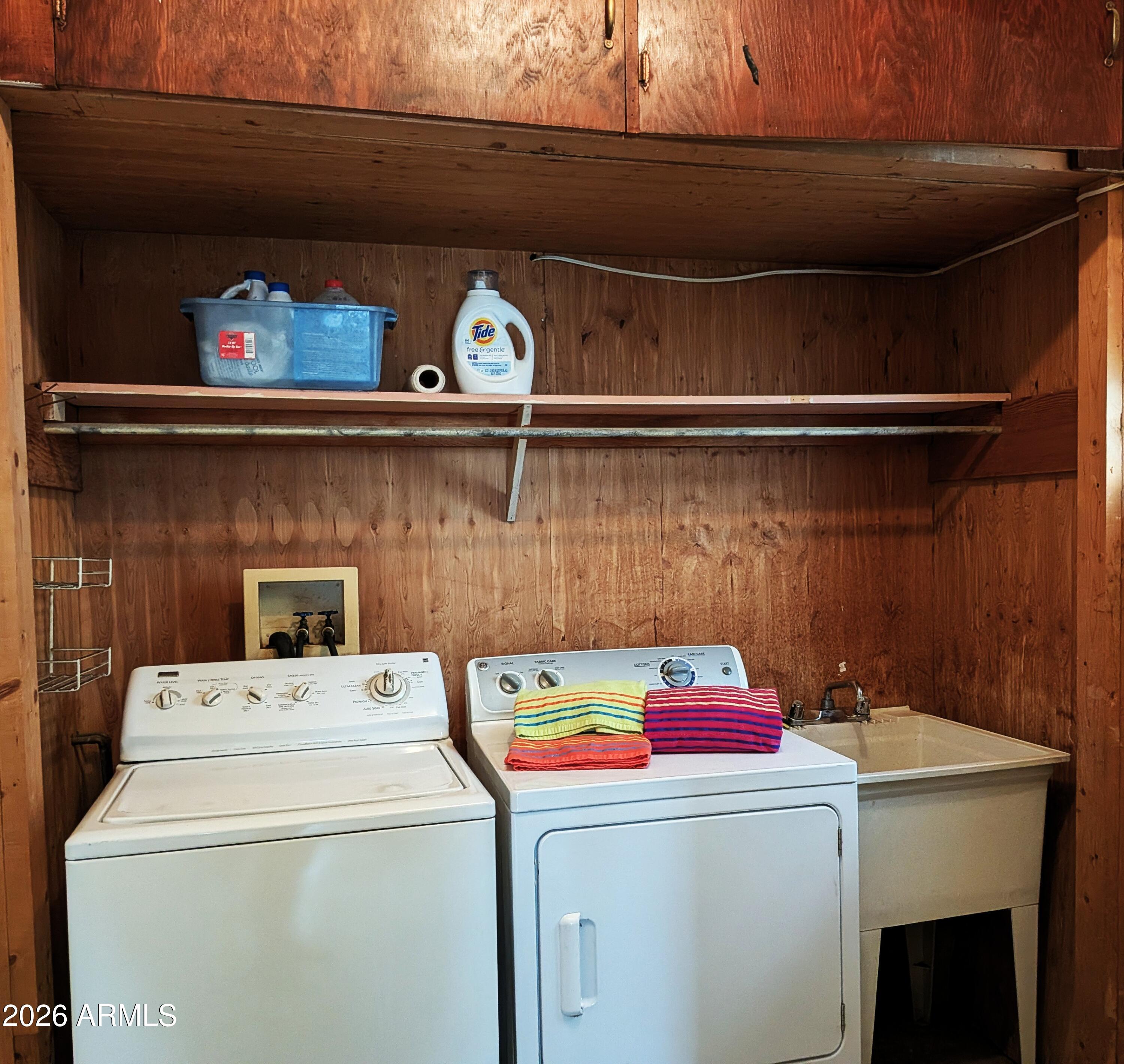 6700 East Thomas Road, Unit 25 Scottsdale, AZ 85251 - Photo 18 of 29 a utility room with dryer and washer