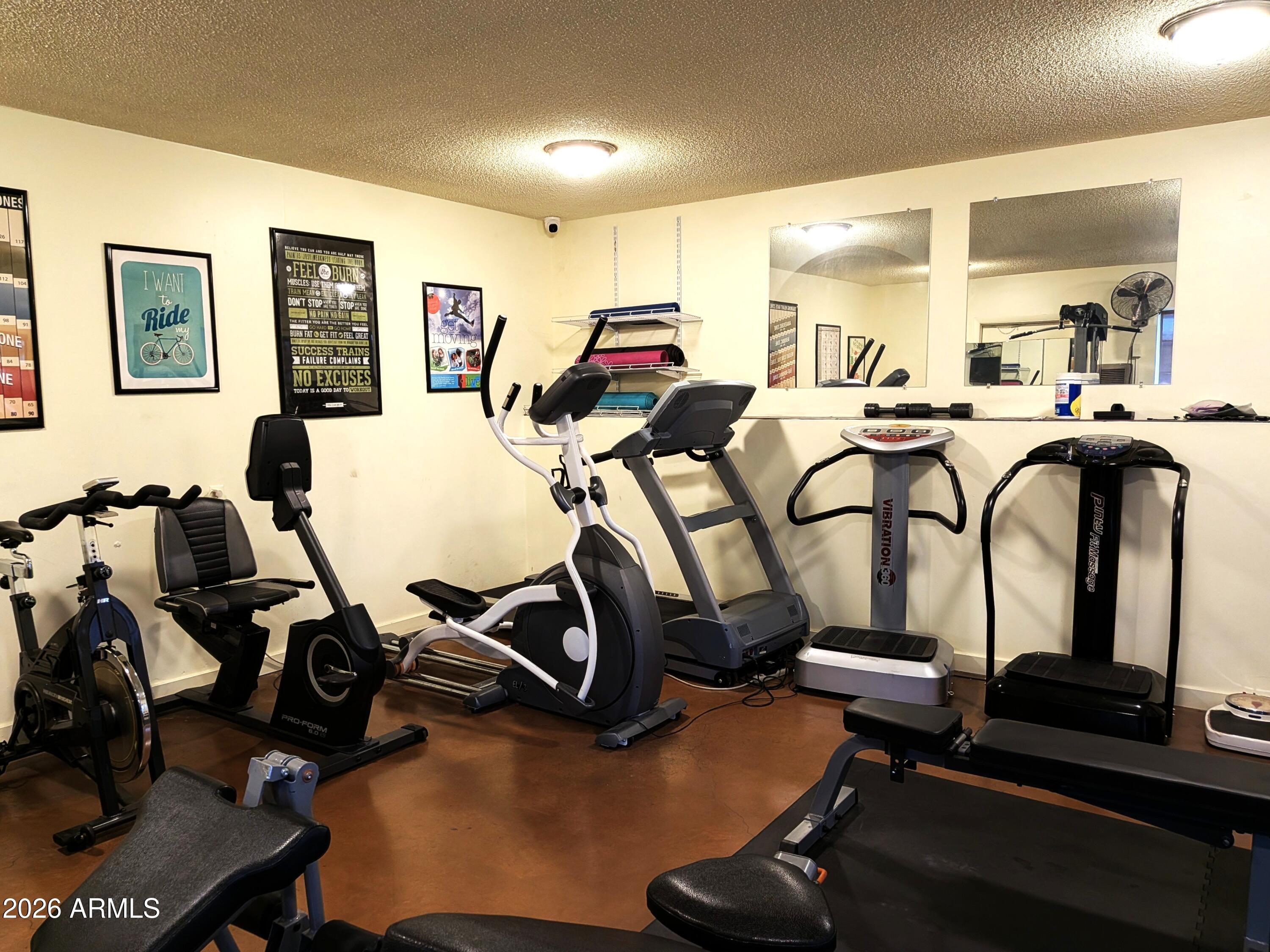 6700 East Thomas Road, Unit 25 Scottsdale, AZ 85251 - Photo 22 of 29 a room with gym equipment and window