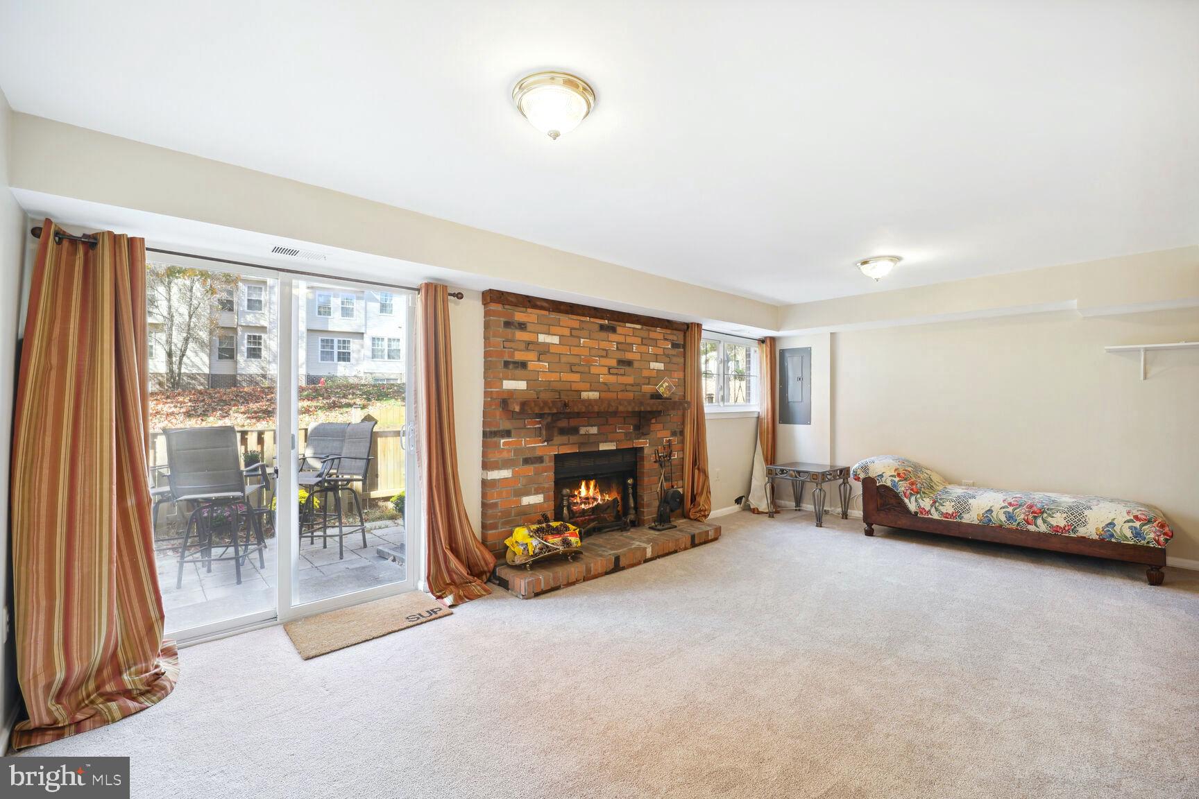 14506 MacBeth Drive, Unit 14506 Silver Spring, MD 20906 - Photo 18 of 28 Basement with fireplace