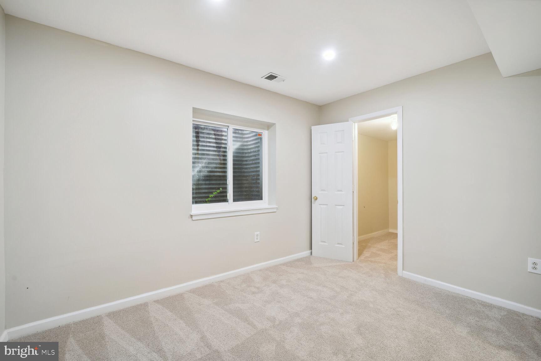 14506 MacBeth Drive, Unit 14506 Silver Spring, MD 20906 - Photo 20 of 28 Basement Level Bedroom