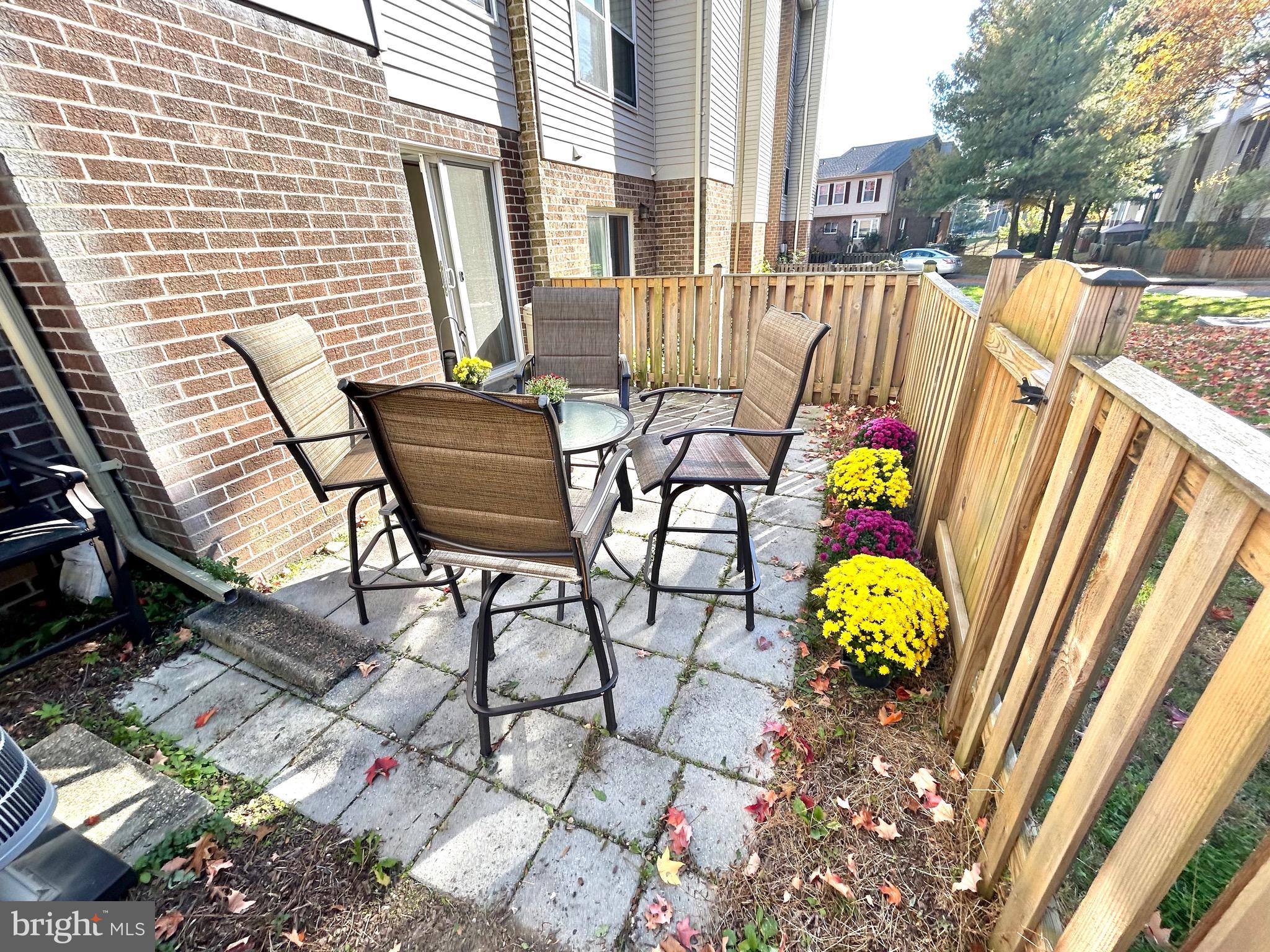 14506 MacBeth Drive, Unit 14506 Silver Spring, MD 20906 - Photo 23 of 28 Low-maintenance back patio overlooks green space