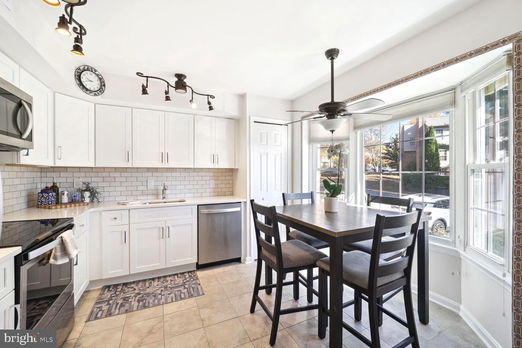 14506 MacBeth Drive, Unit 14506 Silver Spring, MD 20906 - Photo 4 of 28 Brand new kitchen cabinetry. Eat in Kitchen