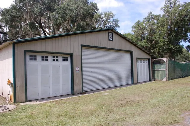 a front view of a house with a garage