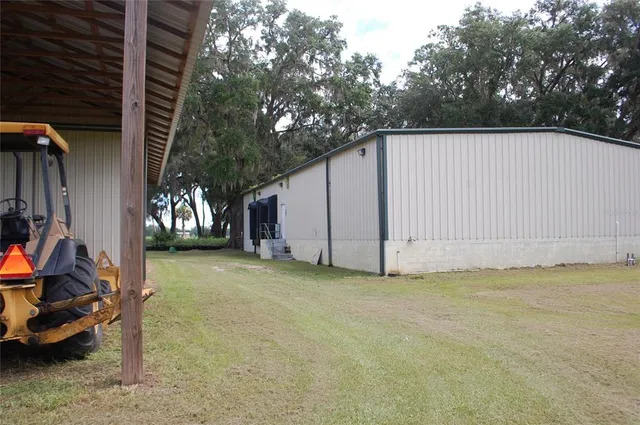a view of a backyard with cabin