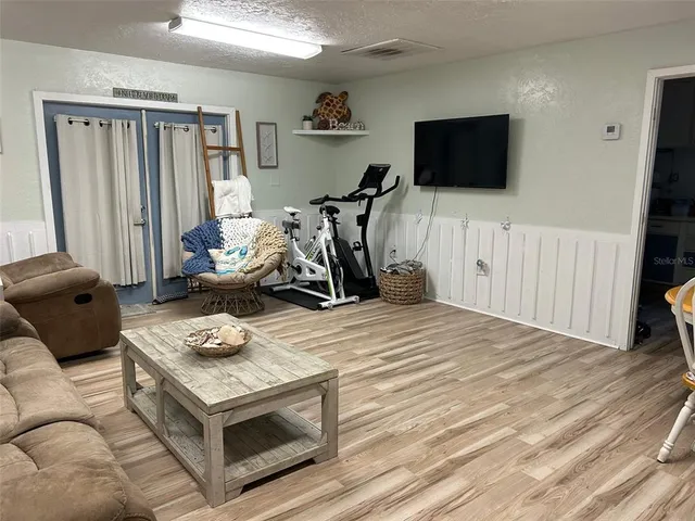 a bathroom with a sink toilet and mirror
