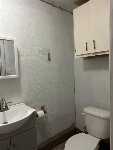 a room that has a bed and a table