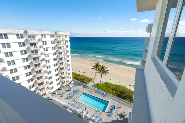 a view of balcony with wooden floor