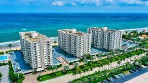 a view of a city with tall buildings in ocean
