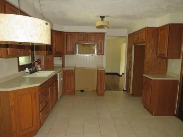 a bathroom with a sink a mirror and a bathtub