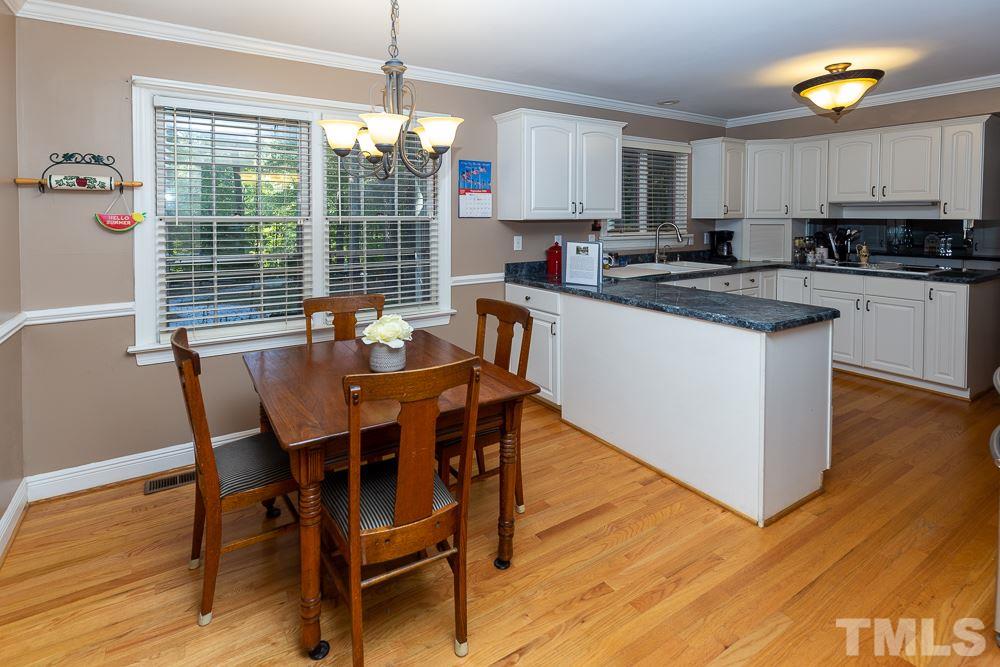 2400 Sunnystone Way Raleigh, NC 27613 - Photo 7 of 29