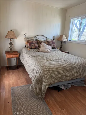a view of a chairs and table in the patio