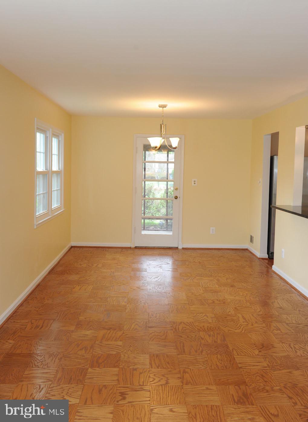 1342 Mayflower Drive McLean, VA 22101 - Photo 8 of 14 an empty room with windows