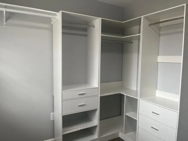 a view of an empty walk in closet