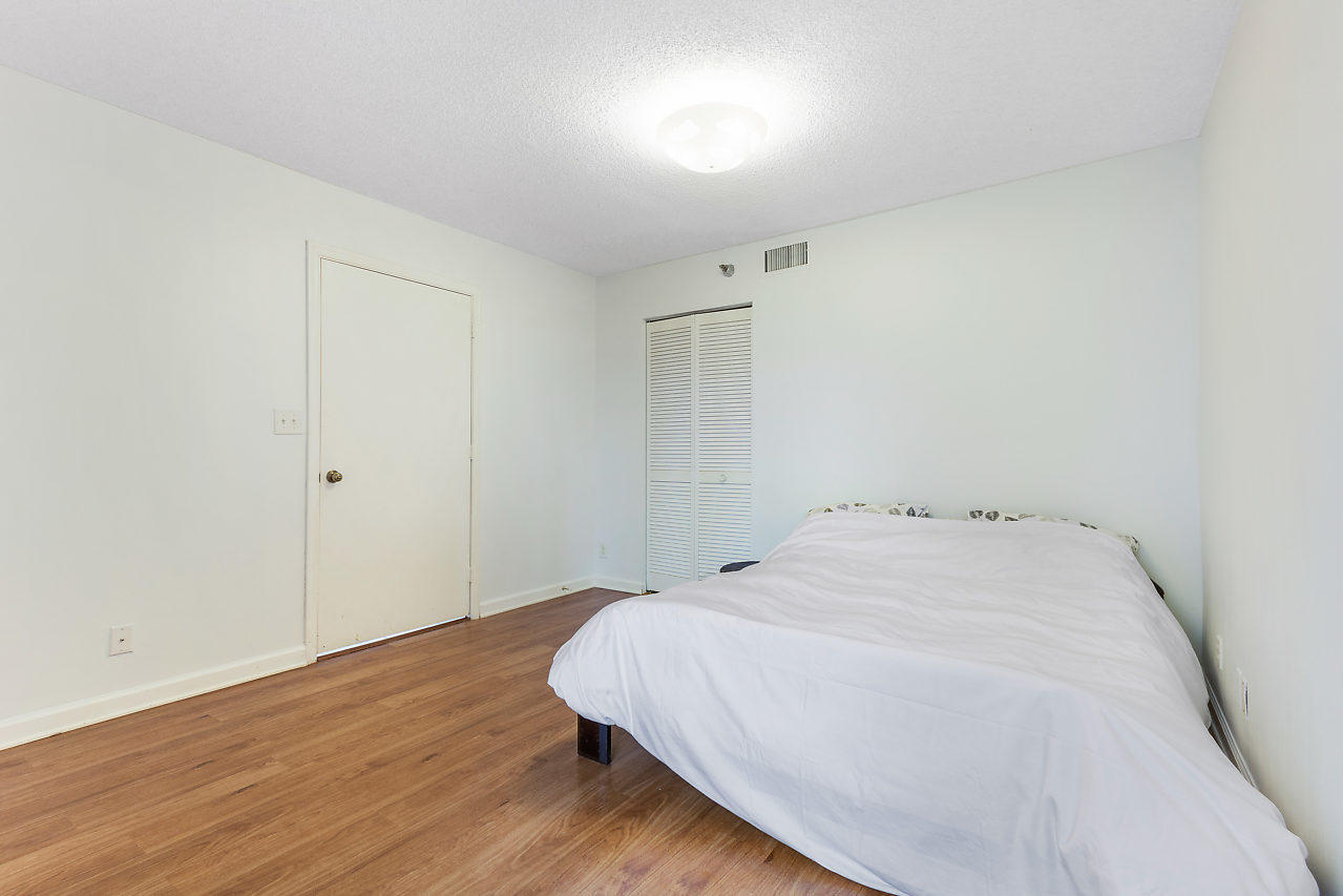420 Northwest 67th Street, Unit K104 Boca Raton, FL 33487 - Photo 13 of 25 Guest Bedroom
