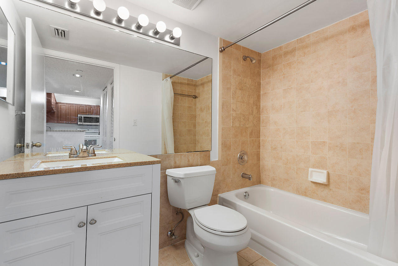 420 Northwest 67th Street, Unit K104 Boca Raton, FL 33487 - Photo 14 of 25 Guest Bathroom